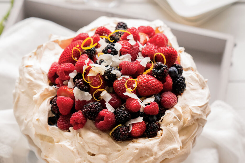 Pavlova with Berries and Lemon-Coconut Whipped Cream