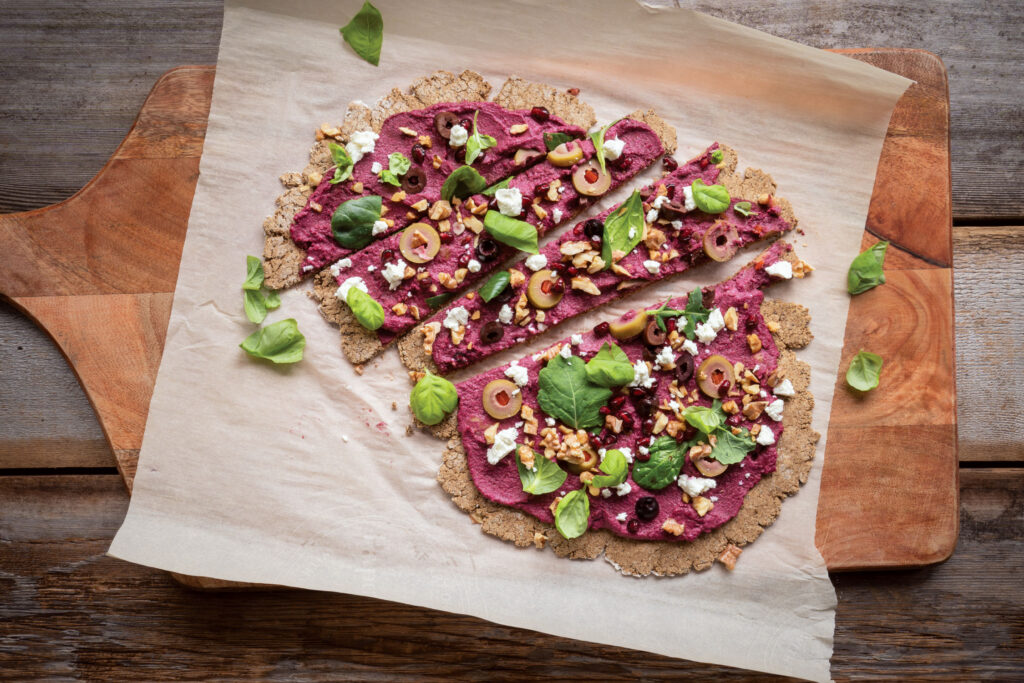 Oat Crust Pizza with Beetroot Hummus and Greens