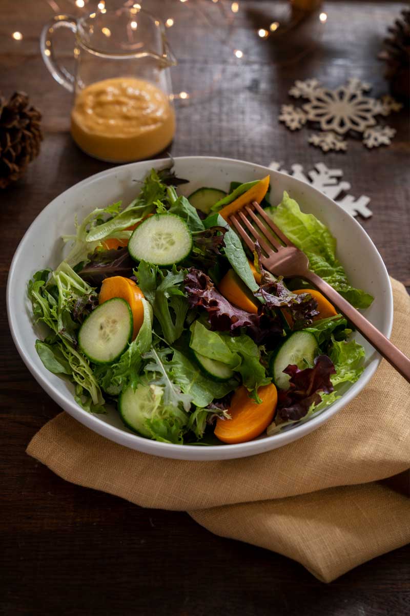 Simple Greens and Persimmon Salad Dressed with White Balsamic