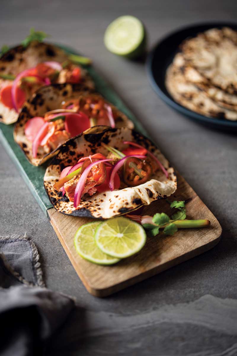Tandoori Salmon Tacos with Spicy Lime-Pickled Radish and Onion