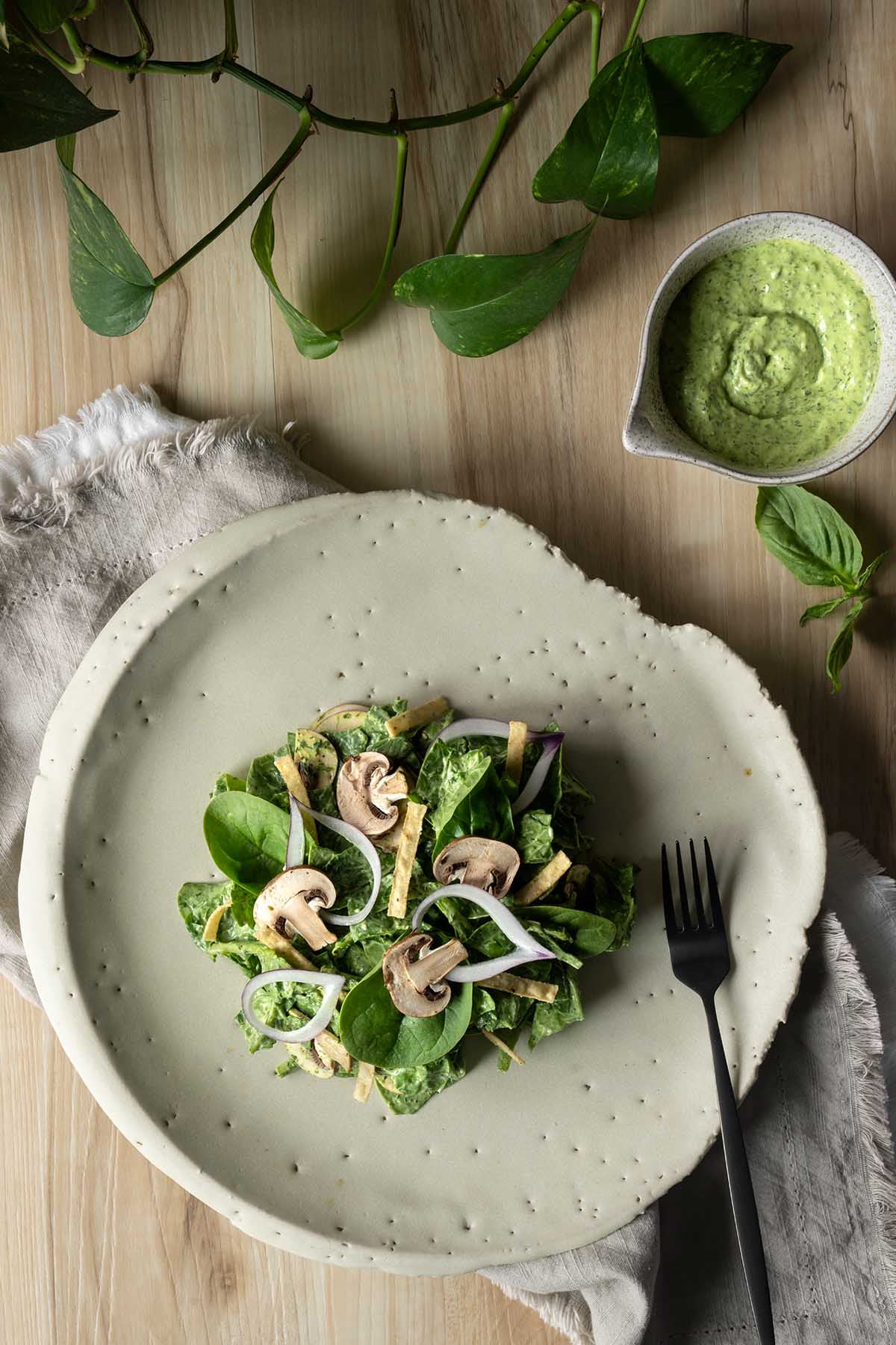 Spinach and Mushroom Salad with Avocado Green Goddess Dressing