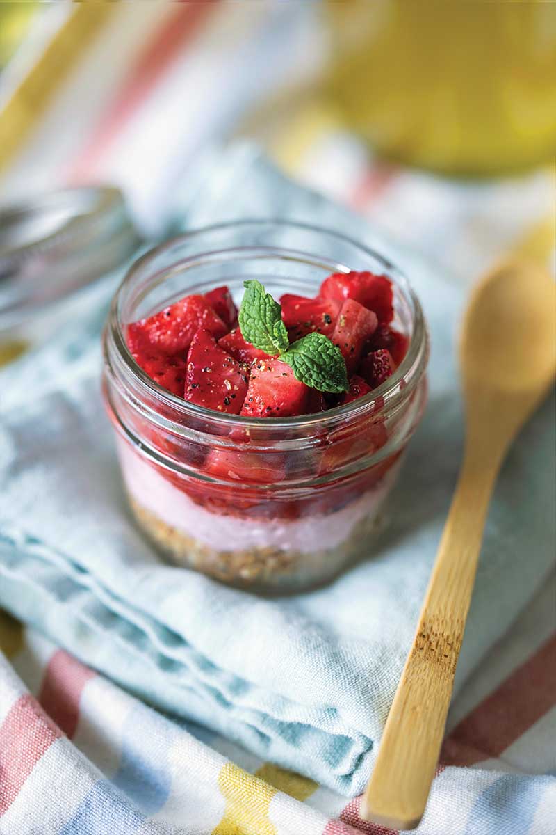 Strawberry coconut cream pots with mint and black pepper